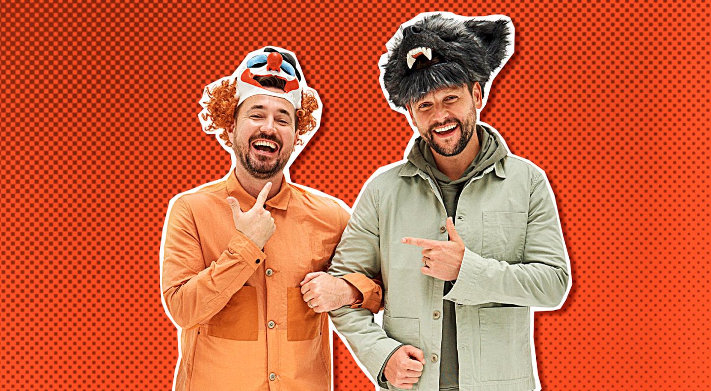 Martin Compston and Gordon Smart, wearing a clown mask and a werewolf mask on their heads, pushed up so we can see their faces
